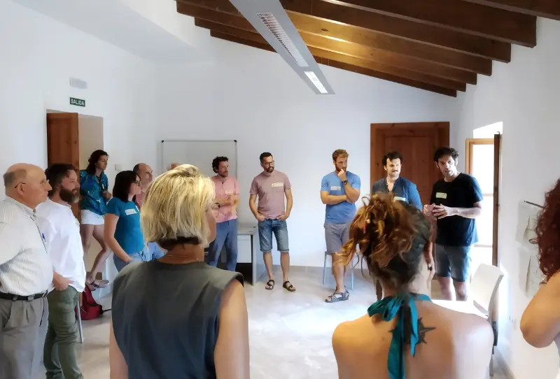 miembros de la ictib en una reunion de trabajo